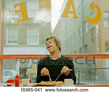 Stock Photography - man wearing a 
face mask in cafe. 
fotosearch - search 
stock photos, 
pictures, images, 
and photo clipart