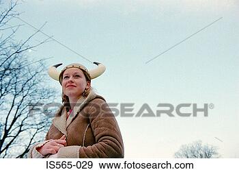 Stock Photograph - woman wearing 
viking helmet. 
fotosearch - search 
stock photos, 
pictures, images, 
and photo clipart
