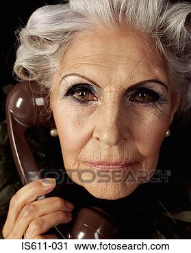 Stock Photography - glamourous senior 
woman on telephone. 
fotosearch - search 
stock photos, 
pictures, images, 
and photo clipart