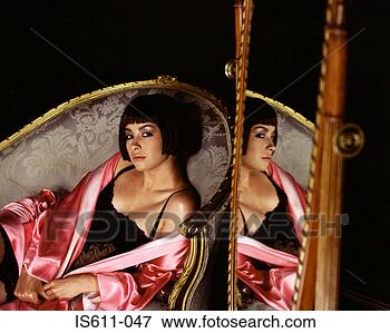 Picture - seductive young 
woman. fotosearch 
- search stock 
photos, pictures, 
images, and photo 
clipart
