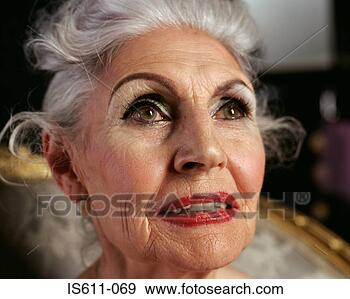 Stock Photograph - senior woman looking 
hopeful. fotosearch 
- search stock 
photos, pictures, 
images, and photo 
clipart