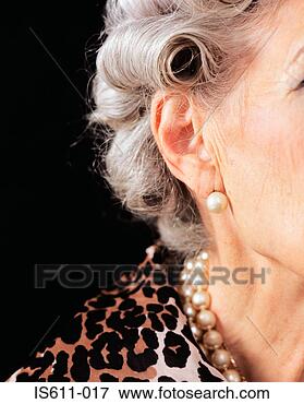 Picture - the side of a 
senior woman's 
face. fotosearch 
- search stock 
photos, pictures, 
images, and photo 
clipart
