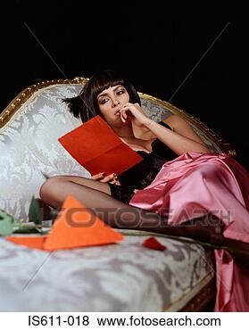 Stock Photo - woman reading 
love letter. fotosearch 
- search stock 
photos, pictures, 
images, and photo 
clipart