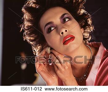 Stock Photo - young woman smelling 
rose. fotosearch 
- search stock 
photos, pictures, 
images, and photo 
clipart
