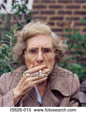 Stock Image - elderly woman 
smoking. fotosearch 
- search stock 
photos, pictures, 
images, and photo 
clipart