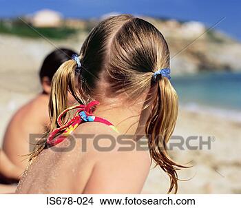 Stock Photo - children at the 
beach. fotosearch 
- search stock 
photos, pictures, 
images, and photo 
clipart