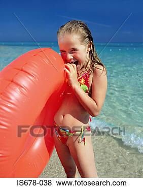 Stock Photo - girl with inflatable 
ring. fotosearch 
- search stock 
photos, pictures, 
images, and photo 
clipart