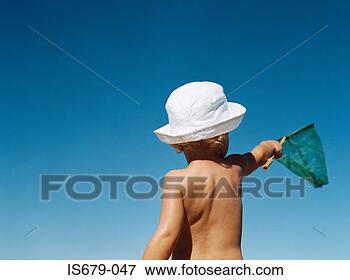 Picture - boy with a butterfly 
net. fotosearch 
- search stock 
photos, pictures, 
images, and photo 
clipart
