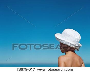 Picture - boy looking out 
to the horizon. 
fotosearch - search 
stock photos, 
pictures, images, 
and photo clipart
