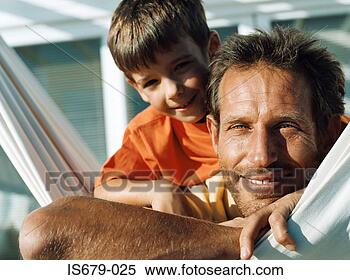 Stock Image - father and son 
on hammock. fotosearch 
- search stock 
photos, pictures, 
images, and photo 
clipart