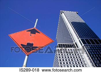 Stock Photo - road sign and 
skyscraper. fotosearch 
- search stock 
photos, pictures, 
images, and photo 
clipart