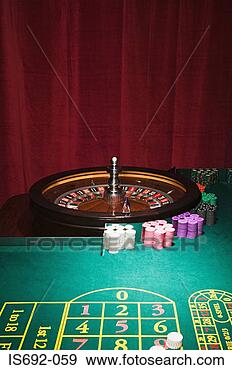 Stock Photograph - roulette wheel 
and table. fotosearch 
- search stock 
photos, pictures, 
images, and photo 
clipart