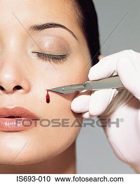 Stock Photography - woman having a 
face lift. fotosearch 
- search stock 
photos, pictures, 
images, and photo 
clipart