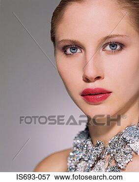 Picture - woman wearing 
glamorous necklace. 
fotosearch - search 
stock photos, 
pictures, images, 
and photo clipart
