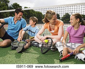 Stock Photograph - family sitting 
on a tennis court. 
fotosearch - search 
stock photos, 
pictures, images, 
and photo clipart