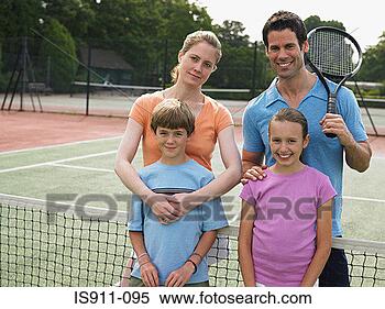 Stock Image - family on a tennis 
court. fotosearch 
- search stock 
photos, pictures, 
images, and photo 
clipart