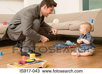 Stock Photo - businessman and 
baby. fotosearch 
- search stock 
photos, pictures, 
images, and photo 
clipart