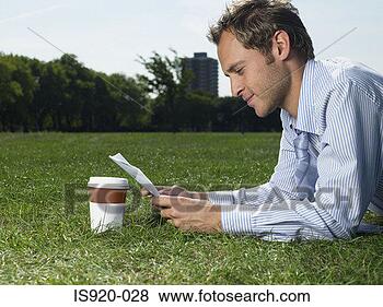 Stock Photo - male office worker 
on lunch break. 
fotosearch - search 
stock photos, 
pictures, images, 
and photo clipart