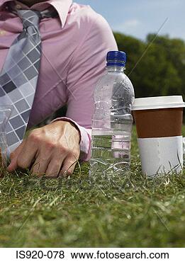 Stock Photo - man resting in 
a park. fotosearch 
- search stock 
photos, pictures, 
images, and photo 
clipart