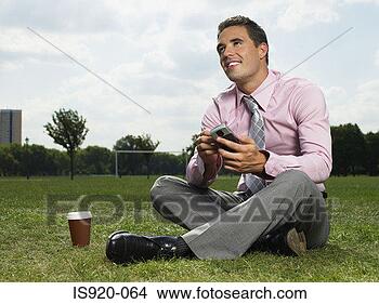 Stock Photo - office worker 
text messaging. 
fotosearch - search 
stock photos, 
pictures, images, 
and photo clipart