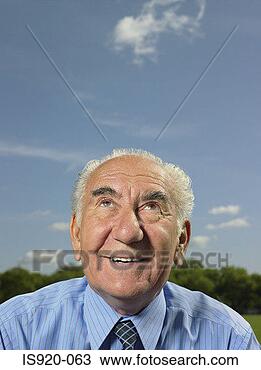 Stock Photo - thoughtful looking 
elderly man. fotosearch 
- search stock 
photos, pictures, 
images, and photo 
clipart