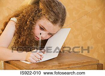 Stock Photography - girl writing a 
greetings card. 
fotosearch - search 
stock photos, 
pictures, images, 
and photo clipart