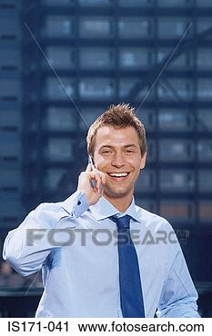 Arquivo de Fotografia - jovem,  homem 
negócios,  móvel, 
 telefone. fotosearch 
- busca de fotos, 
imagens e clipart
