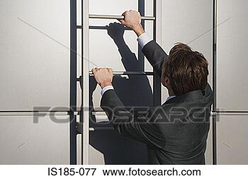 Picture - businessman climbing 
ladder. fotosearch 
- search stock 
photos, pictures, 
images, and photo 
clipart