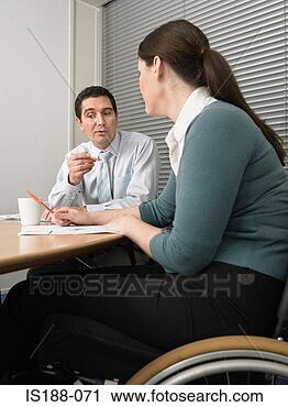 Stock Photography - two office workers 
in meeting. fotosearch 
- search stock 
photos, pictures, 
images, and photo 
clipart