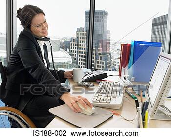 Stock Photo - woman at desk 
on telephone. 
fotosearch - search 
stock photos, 
pictures, images, 
and photo clipart