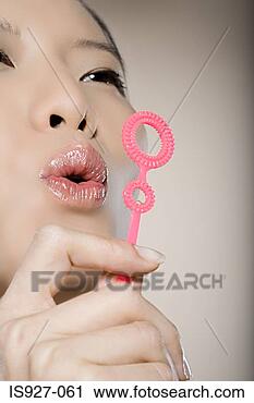 Arquivo de Fotografia - mulher,  bolha, 
 batuta. fotosearch 
- busca de fotos, 
imagens e clipart