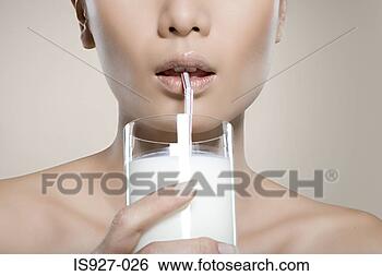 Stock Photo - woman drinking 
milk. fotosearch 
- search stock 
photos, pictures, 
images, and photo 
clipart