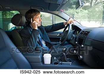 Stock Image - businessman on 
cell phone in 
car. fotosearch 
- search stock 
photos, pictures, 
images, and photo 
clipart
