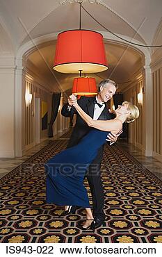 Stock Photo - couple dancing 
in hotel corridor. 
fotosearch - search 
stock photos, 
pictures, images, 
and photo clipart