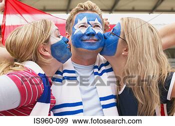 Stock Photograph - footballer supporters 
kissing. fotosearch 
- search stock 
photos, pictures, 
images, and photo 
clipart