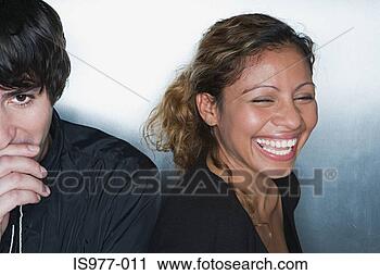 Stock Photography - young man and 
woman laughing. 
fotosearch - search 
stock photos, 
pictures, images, 
and photo clipart