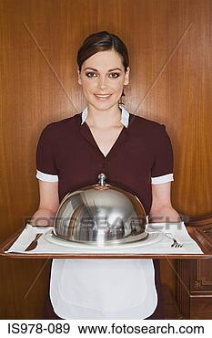 Stock Photograph - maid with meal 
on tray. fotosearch 
- search stock 
photos, pictures, 
images, and photo 
clipart