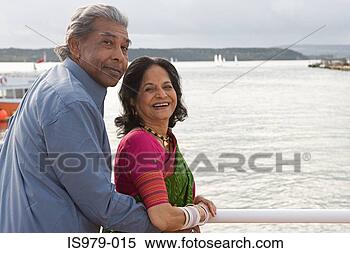 Stock Image - indian couple 
at a harbour. 
fotosearch - search 
stock photos, 
pictures, images, 
and photo clipart