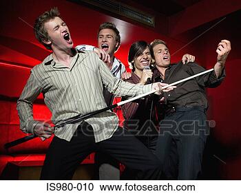 Stock Photography - men singing in 
a bar. fotosearch 
- search stock 
photos, pictures, 
images, and photo 
clipart