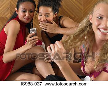 Picture - women getting 
ready to go out. 
fotosearch - search 
stock photos, 
pictures, images, 
and photo clipart