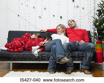 Stock Photography - family at christmas 
time. fotosearch 
- search stock 
photos, pictures, 
images, and photo 
clipart