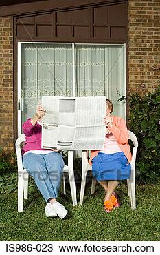 Stock Photo - two senior women 
sharing a newspaper. 
fotosearch - search 
stock photos, 
pictures, images, 
and photo clipart