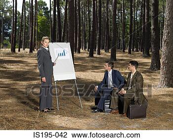 Stock Photo - office workers 
holding meeting 
in forest. fotosearch 
- search stock 
photos, pictures, 
images, and photo 
clipart