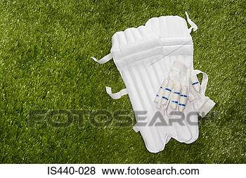 Stock Photo - cricket gloves 
and shin pads. 
fotosearch - search 
stock photos, 
pictures, images, 
and photo clipart