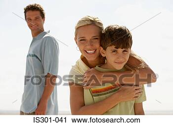 Stock Photography - father looking 
at wife and son. 
fotosearch - search 
stock photos, 
pictures, images, 
and photo clipart