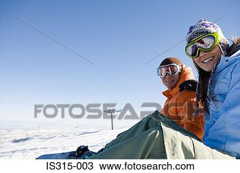 Stock Photo - couple on a ski 
slope. fotosearch 
- search stock 
photos, pictures, 
images, and photo 
clipart