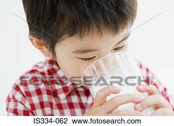 Stock Photo - asian boy drinking 
milk. fotosearch 
- search stock 
photos, pictures, 
images, and photo 
clipart