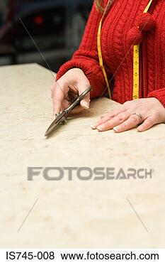 Stock Photo - woman holding 
scissors. fotosearch 
- search stock 
photos, pictures, 
images, and photo 
clipart