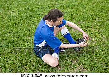 Hazır Fotoğraf - futbolcu,  koyuyor, 
 hara,  bot. fotosearch 
- foto, resim, 
görüntü ve foto 
klipart ara