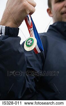 Hazır Fotoğraflar - futbolcu,  stok, 
 madalya. fotosearch 
- foto, resim, 
görüntü ve foto 
klipart ara
